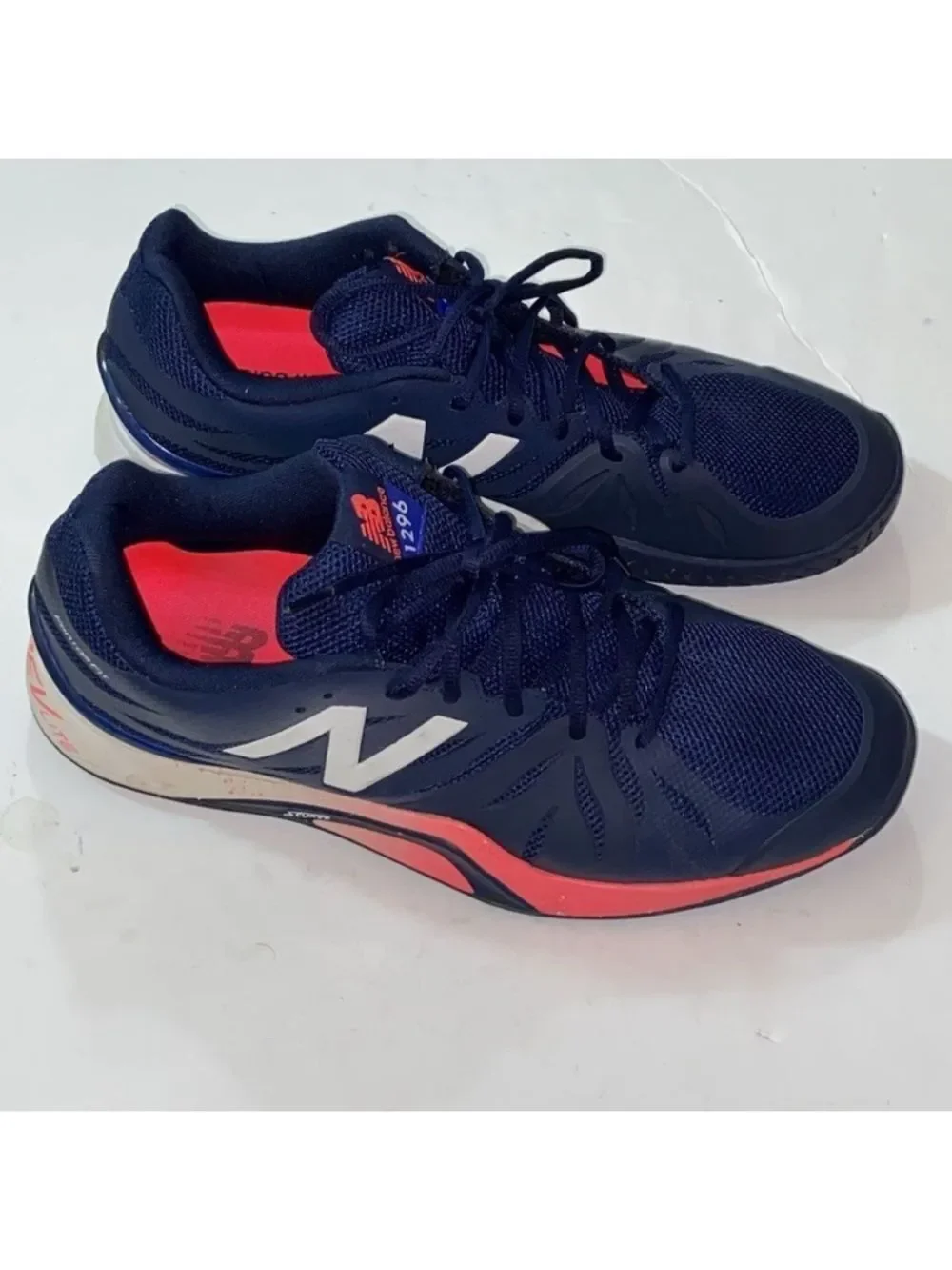 New Balance 1296v2 Men's Navy Athletic Shoes with Coral Accents
